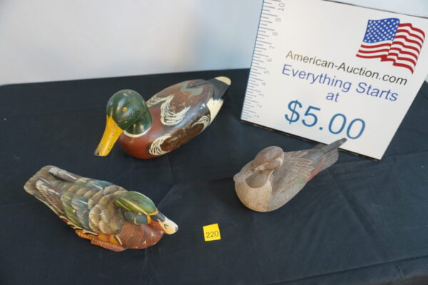 3 wooden ducks