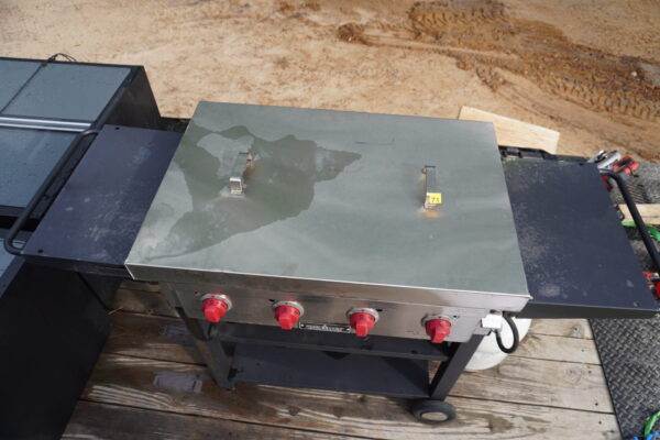 Camp Chef Flat top gas grill 4 burners on wheels, has a homemade stainless still cover - Image 2
