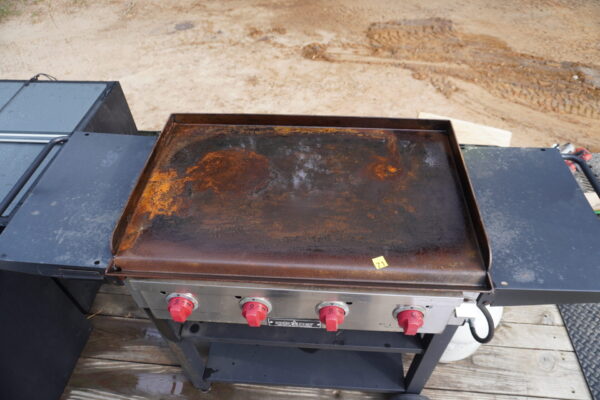 Camp Chef Flat top gas grill 4 burners on wheels, has a homemade stainless still cover - Image 3