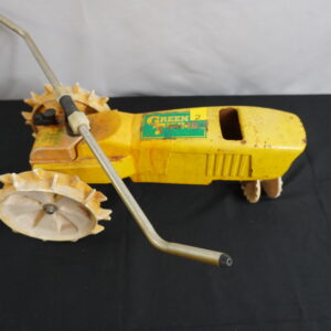 Green Thumb Steel tractor water sprinkler.. VERY heavy, follows your hose 2 speeds