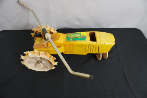 Green Thumb Steel tractor water sprinkler.. VERY heavy, follows your hose 2 speeds