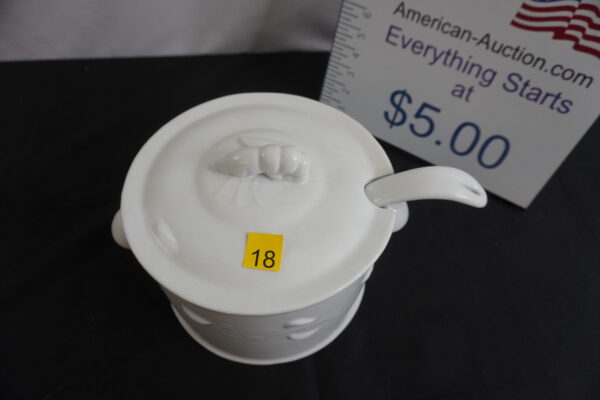 Seafood bowl with shrimp image in spoon and lid handle is a shrimp too