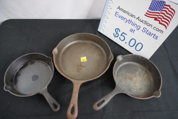 3each cast iron pans.