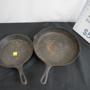 2 each cast iron pans