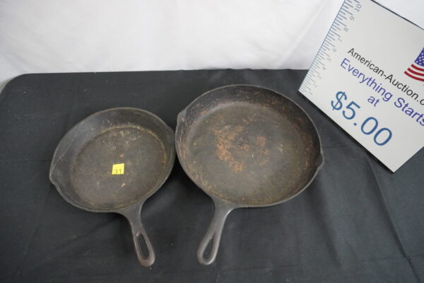 2 each cast iron pans