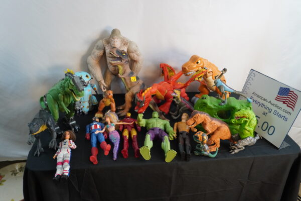 Approx 22 dinosaur/hero/ misc. toys these are quite big dinosaurs!! Surprise a kid today!!