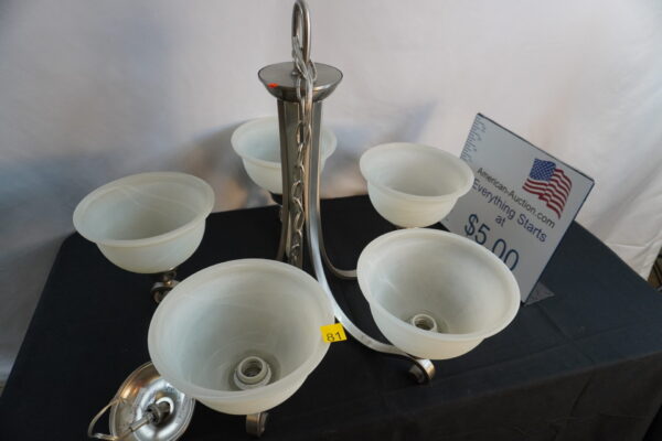 5 light chandelier .heavy. has the very desirable "cracked glass style" globes