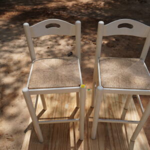 2 White wicker chairs