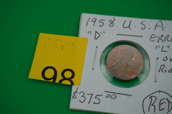 1958 D red error wheat penney "L" on the rim